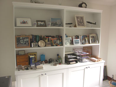 fitted bookcase with cupboards